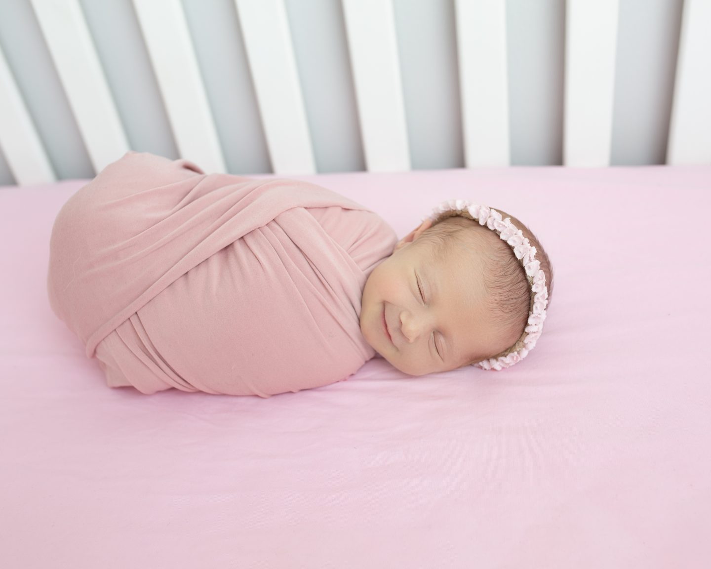 newborn photoshoot smiling