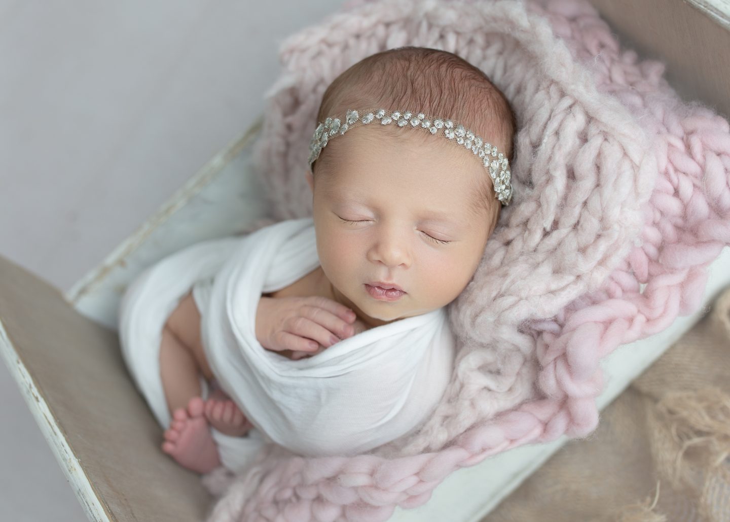 newborn photoshoot swaddle