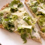 Chicken crust Caesar pizza slices